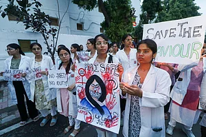 PTI : Doctors of KGMU Lucknow take part in a candle light march in protest against the rape and murder of a trainee doctor in Kolkata, in Lucknow, Monday, Aug 12, 2024 |
